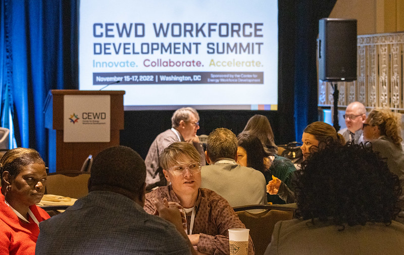 CEWD Summit Attendees and Signage