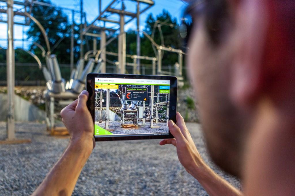 Worker Inspecting an Electric Substation Using Index AR